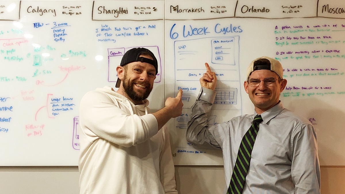 Joe Martin and Justin Breen at a whiteboard